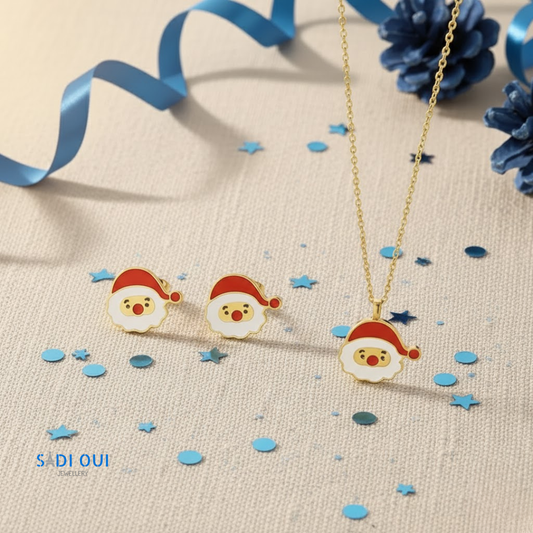 Conjunto Pai Natal Christmas Fun com colar e brincos de Pai Natal dourados em fundo bege com confetis azuis
